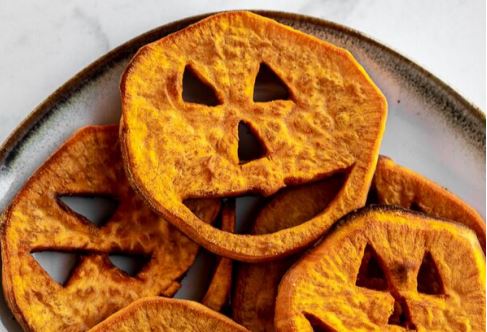 novelty food image of sweet potato sliced like lanterns for halloween from simplyjillicious.com